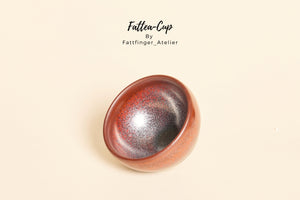 Ember Tenmoku Jianzhan tea cup with dark red metallic ember glaze