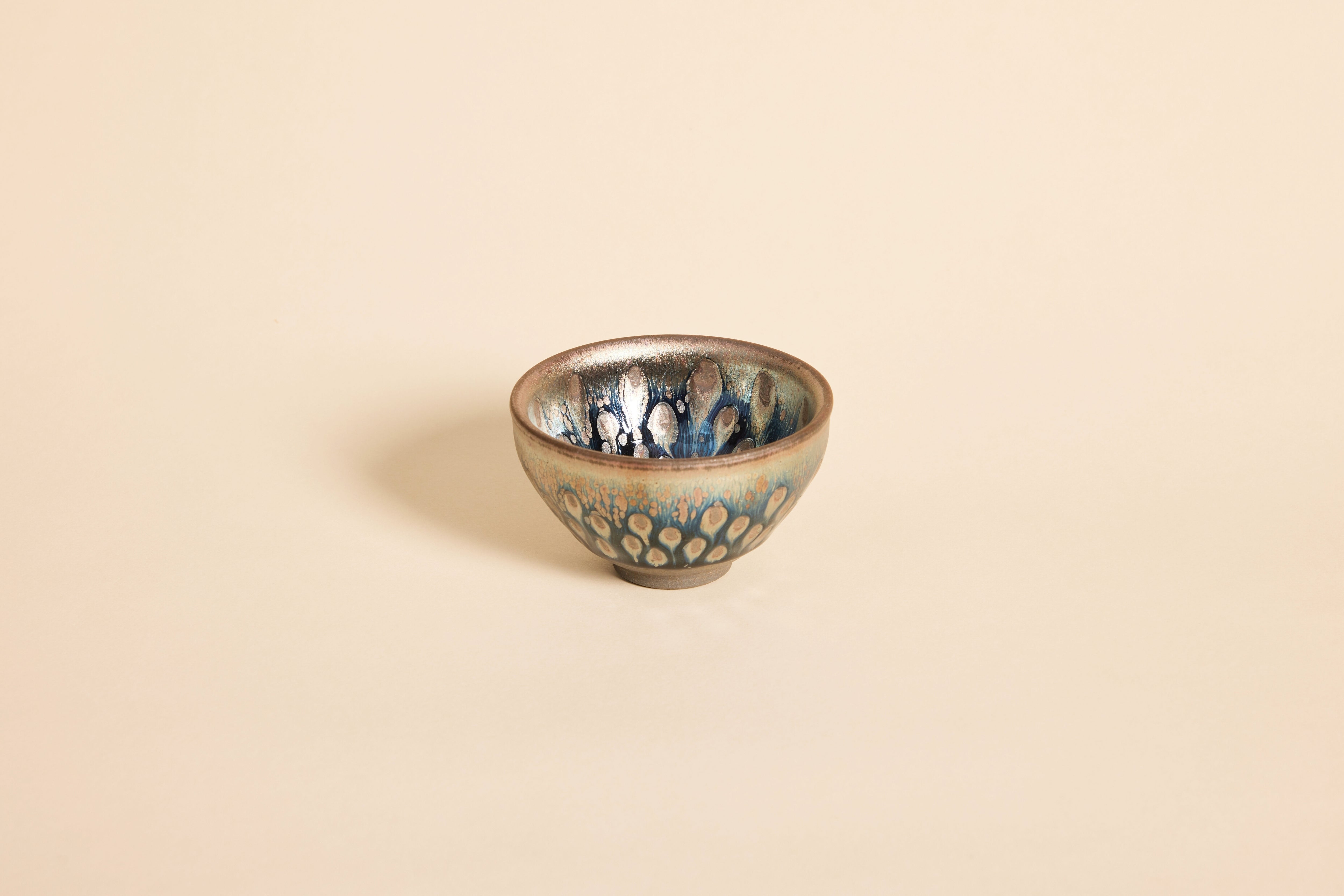 Side view of Tadpole handmade Jianzhan tea cup for Gongfu tea