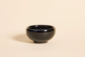 Handmade black Jian ware teacup with subtle gilded highlights